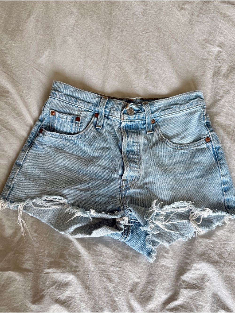 Levi's Light Wash Frayed Hem Denim Shorts